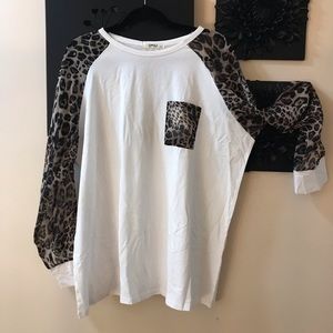 Omsi White T-Shirt with sheer leopard print sleeves.